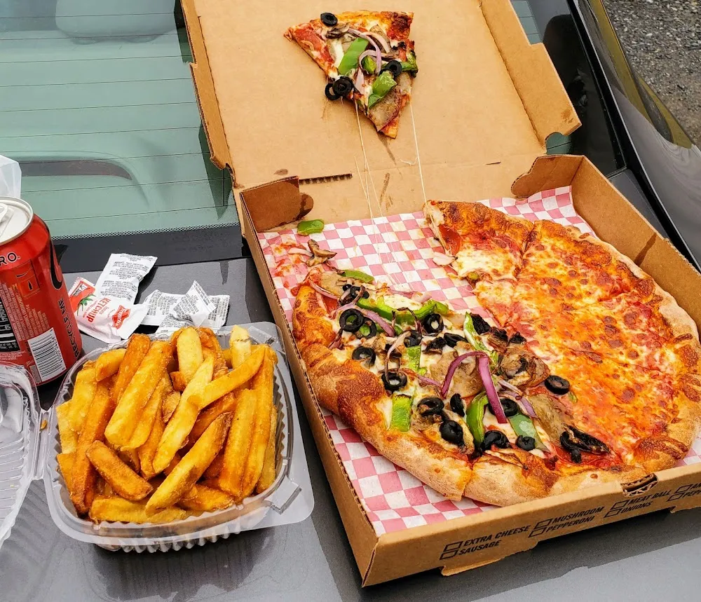 Medium Half Cheese Half Freddy's Supreme Pizza with Fries
